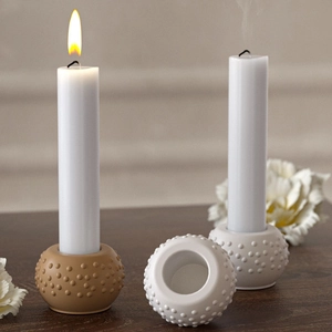 Modern polka dot textured sphere candle holder set in matte khaki and cream ceramic finish