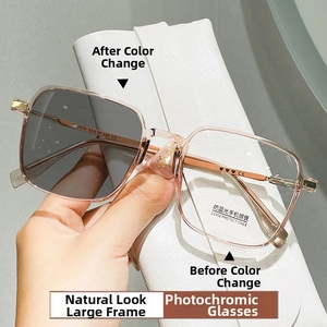 Detail of pink transparent anti-blue light glasses with photochromic lenses and UV400