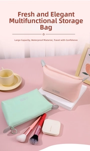 Detail view of pink and green PU leather waterproof makeup bags with zipper closure