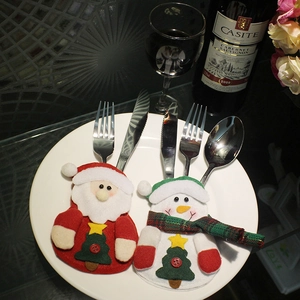 Festive Santa and snowman Christmas cutlery holders for holiday table decor
