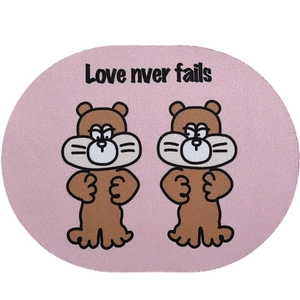 Pink oval mouse pad with cute cartoon beaver design and Love Never Fails text