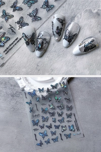 Detail of blue purple laser butterfly nail stickers showing M-G51 holographic designs