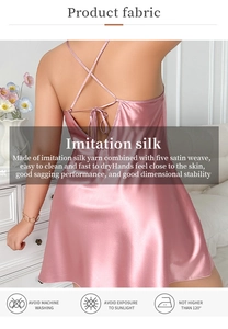 Detailed back view of pink satin sleepwear showing the lace-up back and smooth texture
