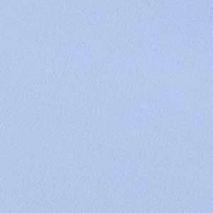 Vue macro de la texture dentelle bleu clair pour robe sexy moulante à manches longues