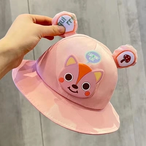 Detail of pink cotton baby sun hat with cute 3D squirrel patch and decorative ears