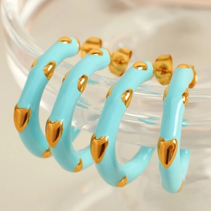 Light blue enamel C-shaped stainless steel earrings with gold heart detail