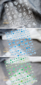 Detailed look at semi-transparent abstract line and colorful polka dot nail art stickers