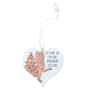 Detail of heart wooden Christmas tag with romantic silhouette and festive text