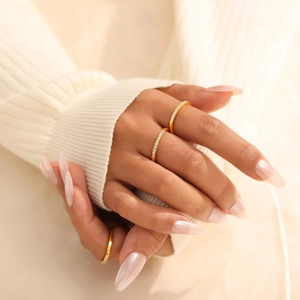 Minimalist stackable 18K gold plated titanium steel rings with white zircon stones for women