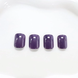 Glossy dark purple short square press-on nails with shiny finish in 4-piece layout