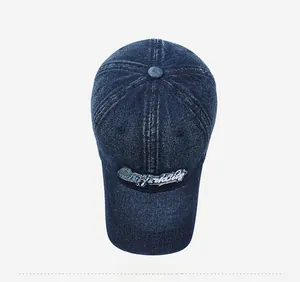 Top-down view of a vintage navy denim baseball cap with New York City white embroidery