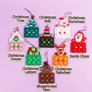 8-piece set of Christmas silicone pop bubble fidget toys featuring tree, deer and snowman shapes