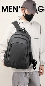 Close-up of waterproof matte texture and multi-pocket design on black backpack