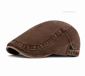 Detail of coffee brown vintage flat cap featuring adjustable bronze metal side buckle