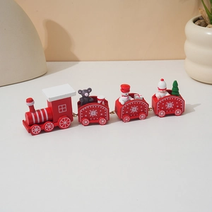 Red wooden Christmas train ornament with snowman and Santa figures for festive holiday decor
