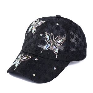 Women's black lace baseball cap with sparkling rhinestone butterflies in 45-degree view