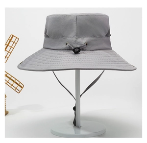Detail of grey sun hat showing breathable mesh side panels and adjustable chin strap