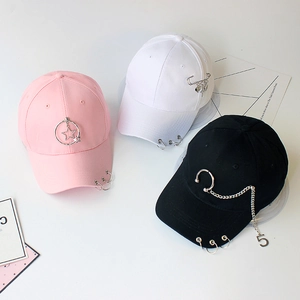 Fashion baseball caps with metal rings and chains in pink, white, and black colors