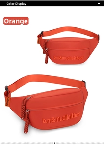 Close-up of orange canvas waist bag showing dual zippers and fashion embroidery details
