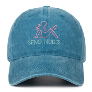 Close-up of pink female silhouette embroidery and SEND NUDES text on washed blue denim cap