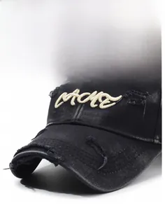 Close-up of distressed brim and 3D embroidery on vintage washed cotton baseball cap