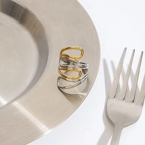 Two-tone intertwined stainless steel ring in gold and silver finish with multi-layer design