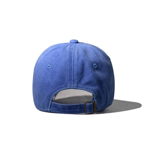 Close-up of vintage washed navy cotton baseball cap with adjustable metal buckle back strap
