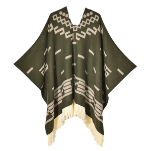 Western style knit poncho with fringe tassels and geometric patterns in olive green