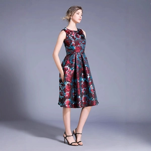 Elegant navy blue floral satin dress with a sleeveless design and cinched waistline
