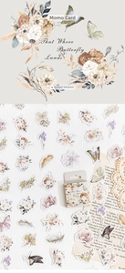 Macro view of vintage butterfly and floral paper stickers for DIY scrapbooking