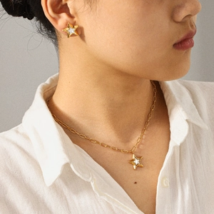 Gold stainless steel star necklace and earrings set with white enamel inlay for women