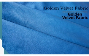 Close-up of premium dark blue golden velvet fabric with soft luster and rich texture