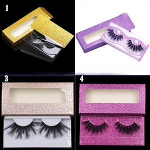 Detailed view of colorful glitter eyelash boxes with matching trays for 25mm lashes