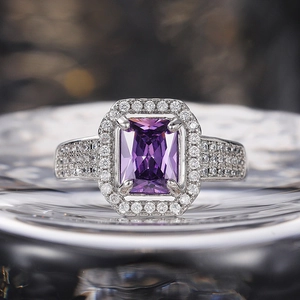 Macro shot of double-layer square purple zircon ring with silver-plated claw setting
