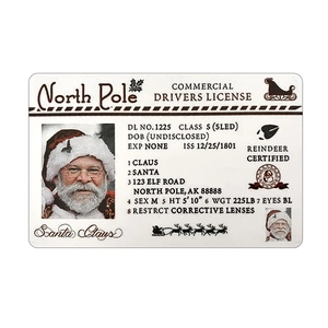 Detail of Santa Claus novelty sleigh driver license card with North Pole ID info