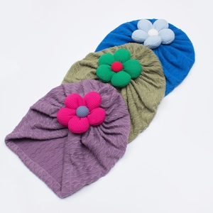 Soft jacquard baby beanies with cute 3D flowers in purple, green, and royal blue