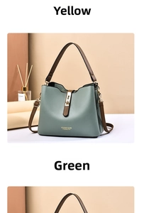 Detail of green and brown contrast handbag with golden buckle and logo in elegant setting
