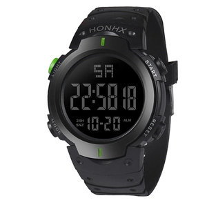 Macro shot of the black digital sport watch dial showing LED display and function buttons