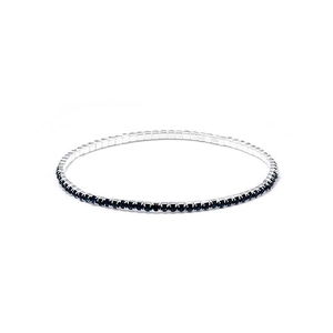 Close-up of a 2.0mm elastic silver bracelet with a single row of dark blue rhinestones