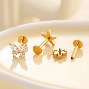 F136 Titan Piercing-Set in Gold mit Schmetterlings- und Sternmotiven und Zirkonia