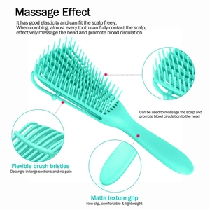 Mint green detangling massage hairbrush with flexible bristles and matte grip for hair care