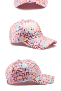 Detail view of colorful sequin checkerboard pattern on a six-panel baseball cap
