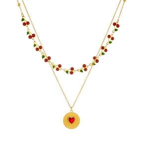 Double-layered gold necklace featuring cherry pendants and a red heart gemstone disc