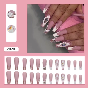 French matte pink coffin press-on nails with 3D white flowers and sparkling rhinestones