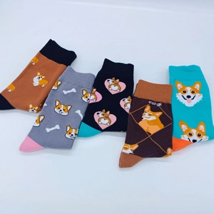 Detailed flat lay of five pairs of cute cartoon Corgi themed mid-calf cotton socks