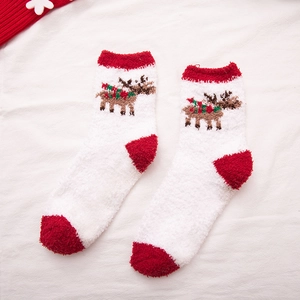 Thick warm coral fleece Christmas socks featuring red trim and brown reindeer pattern