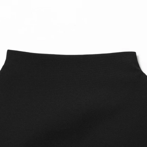 Minimalist black slim-fit mini dress featuring a knotted hemline and knitted texture