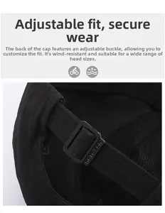 Close-up of adjustable strap with plastic buckle and breathable mesh on a baseball cap