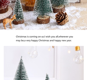 Miniature flocked bottle brush Christmas trees with snow effect and natural wood base