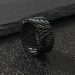 Minimalist black 10mm wide stainless steel mesh ring with textured woven industrial finish